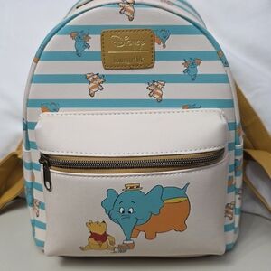 RARE Winnie the Pooh Heffalump Stripe Loungefly Backpack. Extremely hard to find